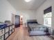 Bedroom with ensuite bathroom and light wood floors at 818 N Jackson St, Salisbury, NC 28144