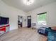 Living room with hardwood floors, featuring an open floor plan at 818 N Jackson St, Salisbury, NC 28144