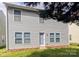 The exterior of this home features double-pane windows and vinyl siding at 1327 Phil Oneil Dr, Charlotte, NC 28215