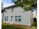 This is a view of the exterior showing the back of this nice home and backyard at 1327 Phil Oneil Dr, Charlotte, NC 28215