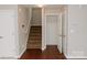 Hallway featuring stairs, a closet, and neutral walls at 1327 Phil Oneil Dr, Charlotte, NC 28215