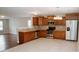Well-equipped kitchen features stainless steel appliances and ample cabinet space, flowing into a bright and open living area at 1327 Phil Oneil Dr, Charlotte, NC 28215
