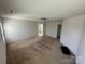 Spacious bedroom with a neutral carpet and two entryways at 2548 Sweet Birch Ct, Gastonia, NC 28054