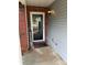 Close-up of the front door area, showing the welcome mat and brick facade at 2548 Sweet Birch Ct, Gastonia, NC 28054