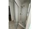 Bathroom shower stall with glass door, showerhead, and seat at 2548 Sweet Birch Ct, Gastonia, NC 28054