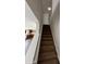 Staircase with carpeted treads and white risers, leading to the second floor at 2548 Sweet Birch Ct, Gastonia, NC 28054
