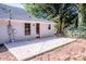 Spacious backyard featuring a patio, fenced perimeter, and connection to the house at 60 Hunter Bridge Rd, Stony Point, NC 28678