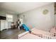 Spacious bedroom with hardwood flooring, play area, and bright light at 60 Hunter Bridge Rd, Stony Point, NC 28678