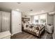 Bedroom features neutral colored hardwood floors and a large bed at 60 Hunter Bridge Rd, Stony Point, NC 28678