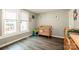 Bedroom filled with natural light featuring hardwood flooring and a neutral color palette at 60 Hunter Bridge Rd, Stony Point, NC 28678