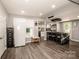 Large open-concept kitchen with island, white appliances and lots of natural light at 60 Hunter Bridge Rd, Stony Point, NC 28678