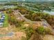 Scenic waterfront community showcasing new construction nestled amongst mature trees at 837 Lake Forest Dr # Nottingham, Belmont, NC 28012