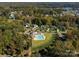 Community aerial view featuring lush landscaping, luxury homes, and community pool at 837 Lake Forest Dr # Nottingham, Belmont, NC 28012