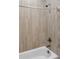 Clean bathroom with a shower/tub combo and updated fixtures at 1528 28Th Street Se Pl, Hickory, NC 28602