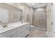 Elegant bathroom with double vanity, and large walk-in shower at 1528 28Th Street Se Pl, Hickory, NC 28602