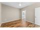 Bright bedroom with hardwood floors and an ensuite bathroom at 1528 28Th Street Se Pl, Hickory, NC 28602