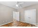 Bedroom with wood-look flooring and double doors at 1528 28Th Street Se Pl, Hickory, NC 28602