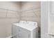 Laundry room with washer, dryer, and shelving at 1528 28Th Street Se Pl, Hickory, NC 28602