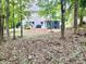 Private backyard with patio and wooded backdrop at 7223 Meyer Rd, Fort Mill, SC 29715