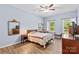 Comfortable bedroom with wood flooring and ample natural light at 7223 Meyer Rd, Fort Mill, SC 29715