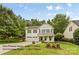 Two-story house with a charming front yard and attached garage at 7223 Meyer Rd, Fort Mill, SC 29715