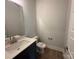 Powder room with modern fixtures, a sleek vanity, and stylish finishes at 3229 Mcharney Dr # 30, Harrisburg, NC 28075