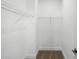 Walk-in closet featuring rod and wire shelving to maximize storage at 3229 Mcharney Dr # 30, Harrisburg, NC 28075