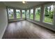 Bright sunroom with large windows providing great views at 3229 Mcharney Dr # 30, Harrisburg, NC 28075