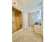 Well-lit bathroom features a tub-shower, double vanity, and elegant wallpaper at 460 27Th Avenue Nw Cir, Hickory, NC 28601