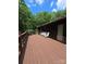 Spacious deck with outdoor seating providing an ideal space for relaxation and enjoying nature views at 460 27Th Avenue Nw Cir, Hickory, NC 28601