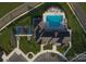 Aerial view of the community pool, tennis courts, and clubhouse at 9653 Liberty Hill Dr, Mint Hill, NC 28227