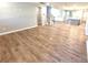 Open concept living room features hardwood floors and ample space for entertaining at 9653 Liberty Hill Dr, Mint Hill, NC 28227