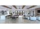 Spacious living room featuring hardwood floors, modern lighting, and neutral colors at 9653 Liberty Hill Dr, Mint Hill, NC 28227