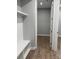 The mudroom has a built-in bench and shelving, offering practical storage solutions at 9653 Liberty Hill Dr, Mint Hill, NC 28227