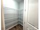 Walk-in pantry features wire shelves providing storage space at 9653 Liberty Hill Dr, Mint Hill, NC 28227