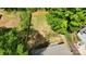 Aerial view of a new privacy fenced backyard with mature trees at 2630 Rose St, Charlotte, NC 28208
