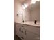 Double vanity bathroom with white cabinets at 2630 Rose St, Charlotte, NC 28208