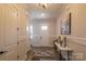 Inviting entryway featuring a console table, decorative art, and a welcoming front door at 2630 Rose St, Charlotte, NC 28208