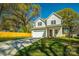 Charming two-story home featuring a well-maintained lawn, concrete driveway, and an attached two-car garage at 2630 Rose St, Charlotte, NC 28208