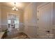 Hallway featuring a glimpse to the kitchen and living room at 2630 Rose St, Charlotte, NC 28208