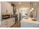 Modern kitchen featuring white cabinets and stainless steel appliances at 2630 Rose St, Charlotte, NC 28208