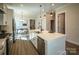 Modern kitchen with island sink, stainless appliances, view to the dining room at 2630 Rose St, Charlotte, NC 28208