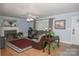 Spacious living room with hardwood floors and a cozy fireplace at 3021 Davis Park Rd, Gastonia, NC 28052