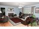 Spacious living room with hardwood floors and a cozy fireplace at 3021 Davis Park Rd, Gastonia, NC 28052