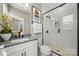 Modern bathroom with glass shower, sleek fixtures, white subway tile, and gray countertop at 5216 Mint Harbor Way # 0284, Charlotte, NC 28269