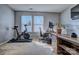 Bright home office features built-in workspace and Peloton at 12528 Generations St, Charlotte, NC 28278