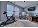 Home office with Peloton bike and work station at 12528 Generations St, Charlotte, NC 28278