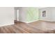 Bright hallway with light wood-look floors and a light green accent wall at 16 Hill St, York, SC 29745