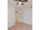 Bedroom with hardwood floors and access to hallway at 2423 Vail Ave # A12, Charlotte, NC 28207