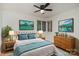 Bright bedroom with wood floors and artwork at 2423 Vail Ave # A12, Charlotte, NC 28207